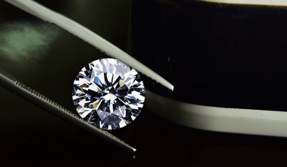 high quality diamond being examined to find out if its real or fake