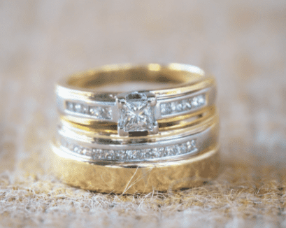 engagement ring and a wedding band stacked on top of each other